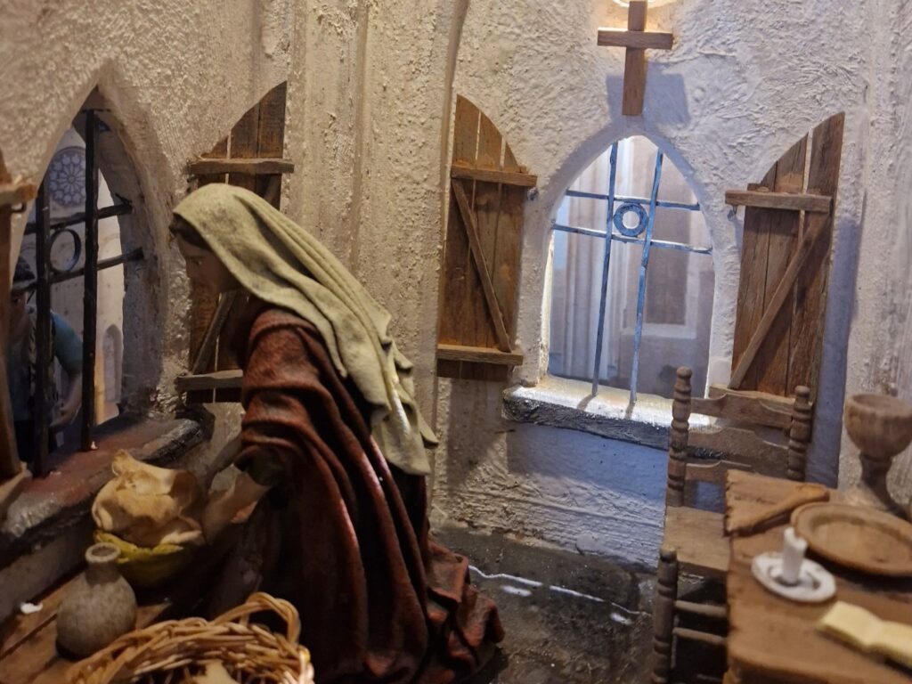Voorstelling van Suster Bertken in haar nis in de Buurkerk